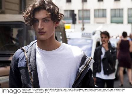 June 19, 2016 - Milan, Italy - Model. A man walks after Salvatore Ferragamo show at Milan Men s Fashion Week in Milan on 19 June, 2016 Milan Italy  - ZUMAn230