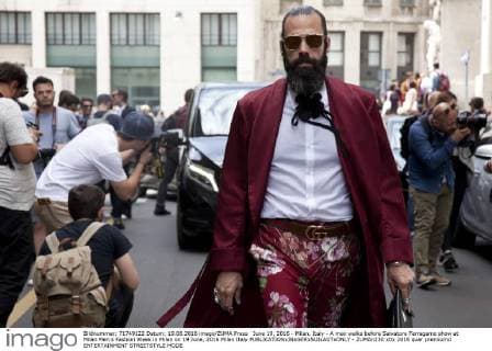 June 19, 2016 - Milan, Italy - A man walks before Salvatore Ferragamo show at Milan Men s Fashion Week in Milan on 19 June, 2016 Milan Italy  - ZUMAn230