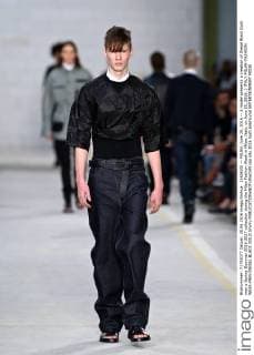 (160620) -- MILAN, June 20, 2016 -- A model presents a creation of Diesel Black Gold men s Spring-Summer 2016-2017 collection during the Milan Fashion Week in Milan, Italy, on June 20, 2016. ) ITALY-MILAN-FASHION WEEK-MEN-DIESEL BLACK GOLD JinxYu 