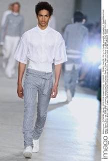 (160620) -- MILAN, June 20, 2016 -- A model presents a creation of Diesel Black Gold men s Spring-Summer 2016-2017 collection during the Milan Fashion Week in Milan, Italy, on June 20, 2016. ) ITALY-MILAN-FASHION WEEK-MEN-DIESEL BLACK GOLD JinxYu 