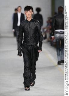 (160620) -- MILAN, June 20, 2016 -- A model presents a creation of Diesel Black Gold men s Spring-Summer 2016-2017 collection during the Milan Fashion Week in Milan, Italy, on June 20, 2016. ) ITALY-MILAN-FASHION WEEK-MEN-DIESEL BLACK GOLD JinxYu 