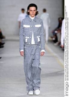 (160620) -- MILAN, June 20, 2016 -- A model presents a creation of Diesel Black Gold men s Spring-Summer 2016-2017 collection during the Milan Fashion Week in Milan, Italy, on June 20, 2016. ) ITALY-MILAN-FASHION WEEK-MEN-DIESEL BLACK GOLD JinxYu 