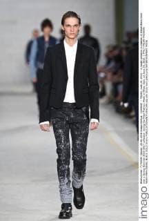 (160620) -- MILAN, June 20, 2016 -- A model presents a creation of Diesel Black Gold men s Spring-Summer 2016-2017 collection during the Milan Fashion Week in Milan, Italy, on June 20, 2016. ) ITALY-MILAN-FASHION WEEK-MEN-DIESEL BLACK GOLD JinxYu 