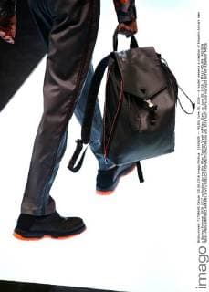 (160620) -- MILAN, June 20, 2016 -- A model presents a creation of Emporio Armani men s Spring-Summer 2016-2017 collection during the Milan Fashion Week in Milan, Italy, on June 20, 2016. ) ITALY-MILAN-FASHION WEEK-MEN-EMPORIO ARMANI JinxYu 
