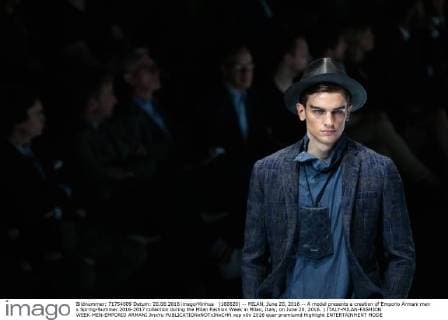 (160620) -- MILAN, June 20, 2016 -- A model presents a creation of Emporio Armani men s Spring-Summer 2016-2017 collection during the Milan Fashion Week in Milan, Italy, on June 20, 2016. ) ITALY-MILAN-FASHION WEEK-MEN-EMPORIO ARMANI JinxYu 