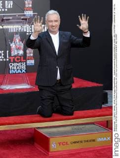 Roland Emmerich ROLAND EMMERICH HAND AND FOOTPRINT CEREMONY AT THE TCL CHINESE THEATER Hollywood Patrick Rideaux PicturePerfect