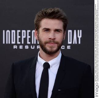 Cast member Liam Hemsworth attends the premiere of the sci-fi motion Independence Day: Resurgence at the El Capitan Theatre in the Hollywood section of Los Angeles on June 20, 2016. Storyline: Two decades after the first Independence Day invasion, Earth is faced with a new extra-Solar threat. But will mankind s new space defenses be enough?  LAP2016062003 JIMxRUYMEN
