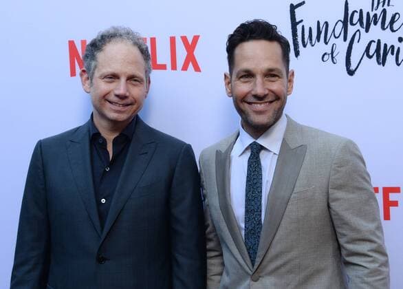 Director Rob Burnett (L) and cast member Paul Rudd attend a screening of Netflix s motion picture drama The Fundamentals of Caring at the ArcLight Cinema Dome in the Hollywood section of Los Angeles on June 23, 2016. Storyline: A man suffering an incredible amount of loss enrolls in a class about care-giving that changes his perspective on life.  LAP2016062306 JIMxRUYMEN