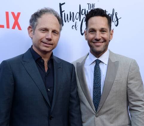 Director Rob Burnett (L) and cast member Paul Rudd attend a screening of Netflix s motion picture drama The Fundamentals of Caring at the ArcLight Cinema Dome in the Hollywood section of Los Angeles on June 23, 2016. Storyline: A man suffering an incredible amount of loss enrolls in a class about care-giving that changes his perspective on life.  LAP2016062323 JIMxRUYMEN
