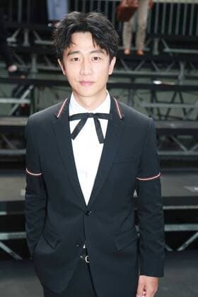 PARIS, FRANCE - JUNE 25: Chinese actor Huang Xuan arrives at the Dior Homme Menswear Spring Summer 2017 show as part of Paris Fashion Week on June 25, 2016 in Paris, France.  CFP487236402