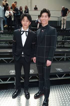 PARIS, FRANCE - JUNE 25: Chinese actors Huang Xuan (L) and Shawn Dou arrive at the Dior Homme Menswear Spring Summer 2017 show as part of Paris Fashion Week on June 25, 2016 in Paris, France.  CFP487236412