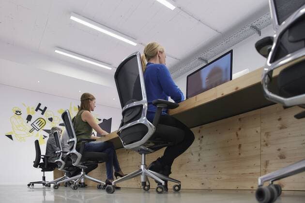 Employees working at computers in office model released Symbolfoto property released  RHF001492