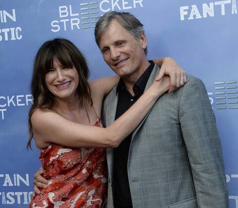 Captain Fantastic Premiere in Hollywood Cast members Kathryn Hahn (L) and Viggo Mortensen attend the premiere of the motion picture drama Captain Fantastic at the Harmony Gold Theatre in the Hollywood section of Los Angeles on June 26, 2016. Storyline: In the forests of the Pacific Northwest, a father devoted to raising his six kids with a rigorous physical and intellectual education is forced to leave his paradise and enter the world, challenging his idea of what it means to be a parent.  LAP2016062828 JIMxRUYMEN