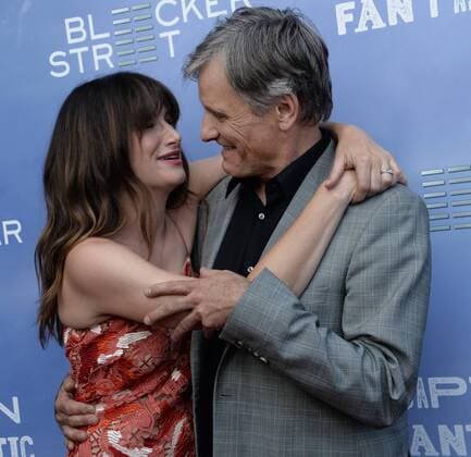 Captain Fantastic Premiere in Hollywood Cast members Kathryn Hahn (L) and Viggo Mortensen attend the premiere of the motion picture drama Captain Fantastic at the Harmony Gold Theatre in the Hollywood section of Los Angeles on June 26, 2016. Storyline: In the forests of the Pacific Northwest, a father devoted to raising his six kids with a rigorous physical and intellectual education is forced to leave his paradise and enter the world, challenging his idea of what it means to be a parent.  LAP2016062823 JIMxRUYMEN