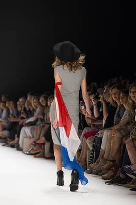 June 29, 2016 - Berlin, Germany - A model carries a French flag as she walks the runway at the Anja Gockel show during the Mercedes-Benz Fashion Week Berlin Spring Summer 2017 at Erika Hess Eisstadion in Berlin, Germany on June 29, 2016. Berlin Germany  - ZUMAn230