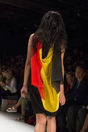 June 29, 2016 - Berlin, Germany - A model carries a German flag as she walks the runway at the Anja Gockel show during the Mercedes-Benz Fashion Week Berlin Spring Summer 2017 at Erika Hess Eisstadion in Berlin, Germany on June 29, 2016. Berlin Germany  - ZUMAn230