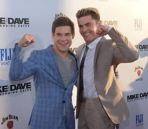 Mike and Dave Need Wedding Dates Filmpremiere in Hollywood Cast members Adan Devine (L) and Zac Efron attend the premiere of the motion picture comedy Mike and Dave Need Wedding Dates at the ArcLight Cinema Dome in the Hollywood section of Los Angeles on June 29, 2016. Storyline: Hard-partying brothers place an online ad to find the perfect dates for their sister s Hawaiian wedding. Hoping for a wild getaway, the boys instead find themselves outsmarted and out-partied by the uncontrollable duo.  LAP2016062915 JIMxRUYMEN