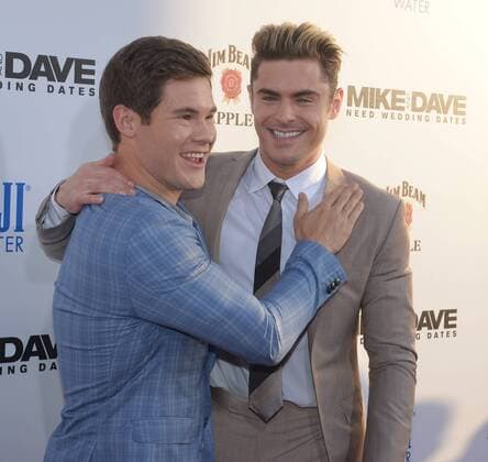 Cast members Adan Devine (L) and Zac Efron attend the premiere of the motion picture comedy Mike and Dave Need Wedding Dates at the ArcLight Cinema Dome in the Hollywood section of Los Angeles on June 29, 2016. Storyline: Hard-partying brothers place an online ad to find the perfect dates for their sister s Hawaiian wedding. Hoping for a wild getaway, the boys instead find themselves outsmarted and out-partied by the uncontrollable duo.  LAP2016062918 JIMxRUYMEN