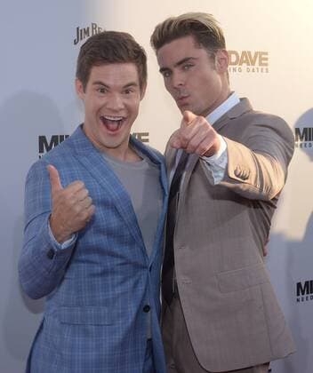 Cast members Adan Devine (L) and Zac Efron attend the premiere of the motion picture comedy Mike and Dave Need Wedding Dates at the ArcLight Cinema Dome in the Hollywood section of Los Angeles on June 29, 2016. Storyline: Hard-partying brothers place an online ad to find the perfect dates for their sister s Hawaiian wedding. Hoping for a wild getaway, the boys instead find themselves outsmarted and out-partied by the uncontrollable duo.  LAP2016062920 JIMxRUYMEN