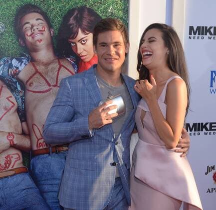 Cast member Adan Devine (L) and actress Chloe Bridges attend the premiere of the motion picture comedy Mike and Dave Need Wedding Dates at the ArcLight Cinema Dome in the Hollywood section of Los Angeles on June 29, 2016. Storyline: Hard-partying brothers place an online ad to find the perfect dates for their sister s Hawaiian wedding. Hoping for a wild getaway, the boys instead find themselves outsmarted and out-partied by the uncontrollable duo.  LAP2016062923 JIMxRUYMEN