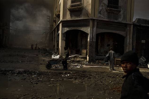 Jan 31, 2010 - Port-au-Prince, Haiti - The eruption of violence and looting when the hungry, desperate and frustrated people of Haiti, unassisted by their country s leaders or helped by the international community, decided to find their own means of survival in the badly damaged capital Port-au-Prince after the 7.0 quake in which more then 230,000 people died. PICTURED - A shop burns in Port-au-Prince Bel Air neighborhood. - ZUMAl88_