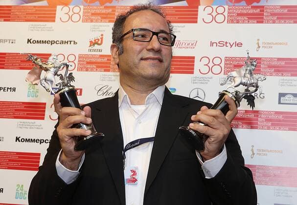 MOSCOW, RUSSIA - JUNE 30, 2016: Director Reza Mirkarimi with the Golden George award main prize for the best film for his film Daughter at the closing of the 38th Moscow International Film Festival. Vyacheslav Prokofyev TASS  TS028877
