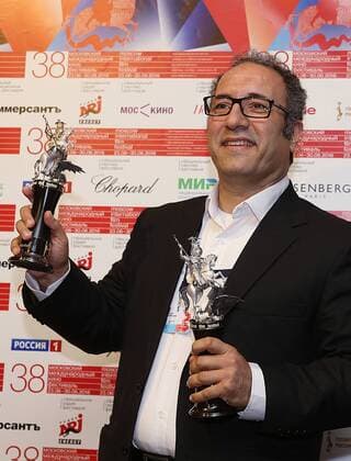 MOSCOW, RUSSIA - JUNE 30, 2016: Director Reza Mirkarimi with the Golden George award main prize for the best film for his film Daughter at the closing of the 38th Moscow International Film Festival. Vyacheslav Prokofyev TASS  TS028879