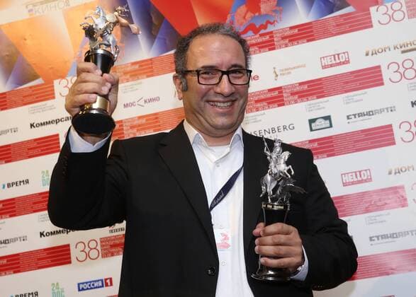 MOSCOW, RUSSIA - JUNE 30, 2016: Director Reza Mirkarimi with the Golden George award main prize for the best film for his film Daughter at the closing of the 38th Moscow International Film Festival. Vyacheslav Prokofyev TASS  TS02887A
