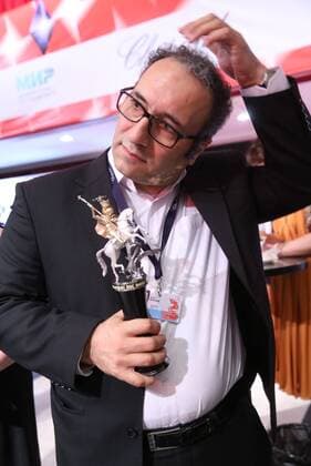 MOSCOW, RUSSIA - JUNE 30, 2016: Director Reza Mirkarimi with the Golden George award main prize for the best film for his film Daughter at the closing of the 38th Moscow International Film Festival. Vyacheslav Prokofyev TASS  TS028883