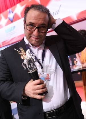MOSCOW, RUSSIA - JUNE 30, 2016: Director Reza Mirkarimi with the Golden George award main prize for the best film for his film Daughter at the closing of the 38th Moscow International Film Festival. Vyacheslav Prokofyev TASS  TS0288A7