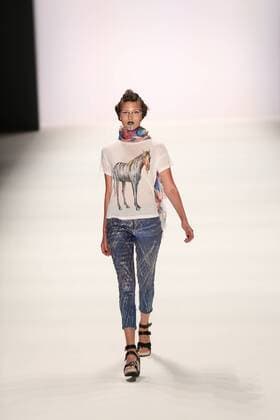 Germany: Jeans for Refugees by Johny Dar The Mercedes-Benz Fashion Week Berlin. Numerous labels are taking part in the German fashion week for the 2017 spring summer season. The photo shows Models with the collection of Jeans for Refugees by Dohny Dar on the catwalk in the Erika Hess Ice Stadium in Berlin-Weding. This year, the designer launched a global artistic collaboration called Jeans for Refugees , dedicated to the world s fugitives and involved over one hundred celebrities. The jeans-Unikate be exhibited in London in October 2016 the Saatchi Gallery and auctioned. The entire proceeds go to the International Rescue Committee, an organization that Escaped and war victims.  SimonexKuhlmey