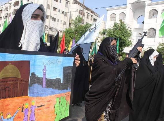 July 1, 2016 - Pakistan - KARACHI, PAKISTAN, JUL 01: Activists Imamia Students Organizations are marking Youm-.ul-Quds in support of Palestine as they are protesting against Israel and USA during rally, at M.A .Jinnah Road in Karachi on Friday, July 01, 2016. Pakistan  - ZUMAas3_