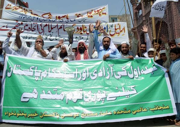 July 1, 2016 - Pakistan - PESHAWAR, PAKISTAN, JUL 01: Members of different religious parties are holding .demonstration as they are marking Youm-ul-Quds in favor of Muslims of Palestine and chanting .slogans against USA and Israel, in Peshawar on Friday, July 01, 2016. Pakistan  - ZUMAas3_