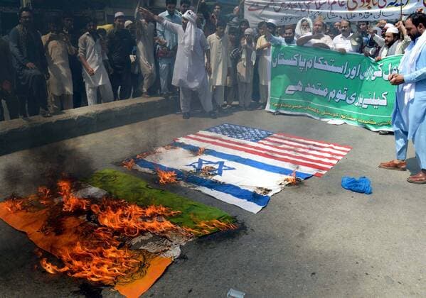 July 1, 2016 - Pakistan - PESHAWAR, PAKISTAN, JUL 01: Members of different religious parties are holding .demonstration as they are marking Youm-ul-Quds in favor of Muslims of Palestine and chanting .slogans against USA and Israel, in Peshawar on Friday, July 01, 2016. Pakistan  - ZUMAas3_