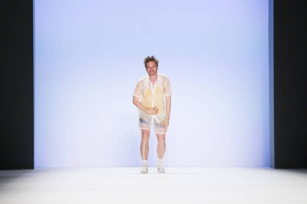 Fashion Designer Julian Zigerli greets the guests at the beginning of the Julian Zigerli show during the Mercedes-Benz Fashion Week Berlin Spring Summer 2017 at Erika Hess Eisstadion in Berlin, Germany on July 1st, 2016.  - ZUMAn230