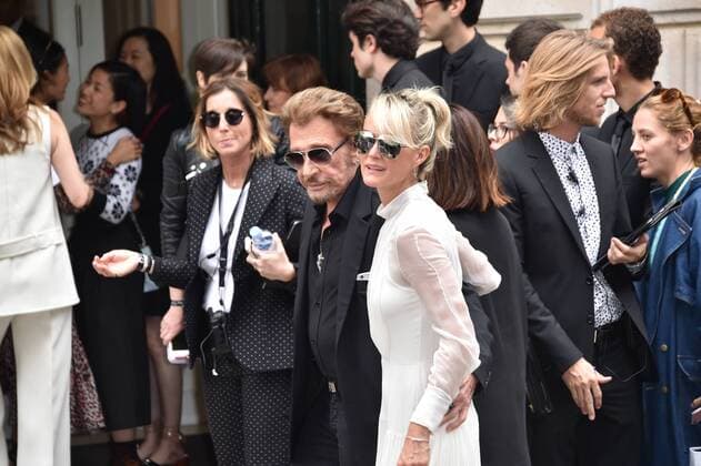 Singer Johnny Hallyday and his wife Laeticia attend the Christian Dior Haute Couture Fall Winter 2016-2017 show as part of Paris Fashion Week in Paris, France. PEOPLE: Fashion Week Modeschau Christian Dior - Fashion Week de Paris - 04 07 2016 LionelUrman 