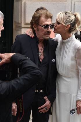 Singer Johnny Hallyday and his wife Laeticia leave the Christian Dior Haute Couture Fall Winter 2016-2017 show as part of Paris Fashion Week in Paris, France. PEOPLE: Fashion Week Modeschau Christian Dior - Fashion Week de Paris - 04 07 2016 LionelUrman 