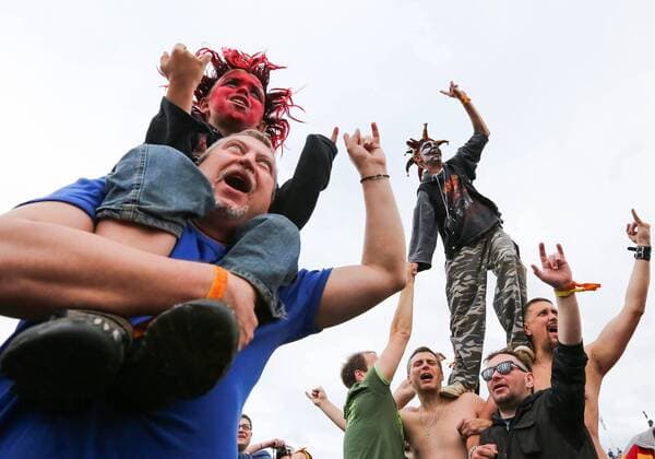 TVER REGION, RUSSIA - JULY 8, 2016: People attend the 16th Nashestvie (Invasion) rock music festival in the village of Bolshoye Zavidovo. Alexander Ryumin TASS  TS02969C