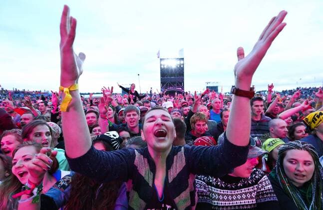 TVER REGION, RUSSIA - JULY 8, 2016: People attend the 16th Nashestvie (Invasion) rock music festival in the village of Bolshoye Zavidovo. Alexander Ryumin TASS  TS0296A0
