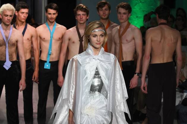 Models present creations by Pierre Cardin during a fashion show in Bonnieux, southern France, July 9, 2016. ) FRANCE-FASHION-PIERRE CARDIN LixGenxing 