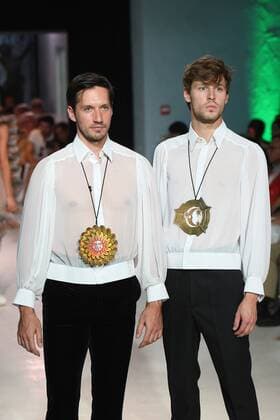 Models present creations by Pierre Cardin during a fashion show in Bonnieux, southern France, July 9, 2016. ) FRANCE-FASHION-PIERRE CARDIN LixGenxing 