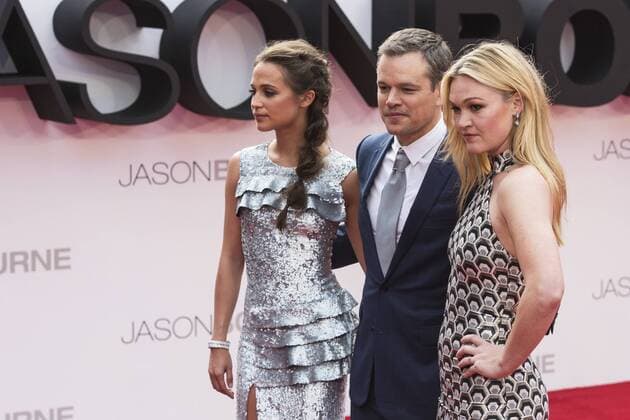 London, UK. 11 July 2016. L-R: Alicia Vikander, Matt Damon and Julia Stiles. Red carpet arrivals for the European Premiere of the Universal movie Jason Bourne (2016) in London s Leicester Square. European Premiere of Jason Bourne, London, UK 