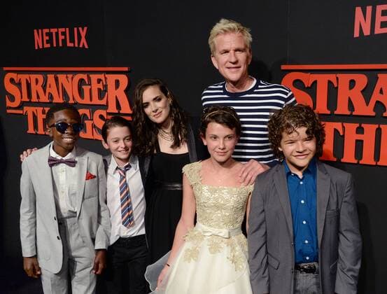 Cast members Caleb McLaughlin, Noah Schnapp, Winona Ryder, Matthew Modine, Millie Brown and Gaten Matarazzo (L-R) attend Netflix s supernatural mystery thriller Stranger Things at Mack Sennett Studios in Los Angeles on July 11, 2016. Storyline: A strange town where everyone knows everyone Is subject to a peculiar incident. The town then undergoes a state of panic, before the government becomes involved.  LAP2016071126 JIMxRUYMEN
