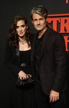 Cast member Winona Ryder and Scott Mackinlay Hahn attend Netflix s supernatural mystery thriller Stranger Things at Mack Sennett Studios in Los Angeles on July 11, 2016. Storyline: A strange town where everyone knows everyone Is subject to a peculiar incident. The town then undergoes a state of panic, before the government becomes involved.  LAP2016071139 JIMxRUYMEN