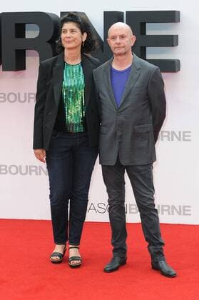 British film producer Amanda Posey and her husband, Nick Hornby attending the European Premiere of Jason Bourne at Odeon Leicester Square, in London. July 11th 2016  PTYx162234