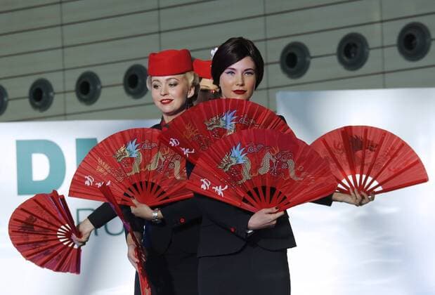 MOSCOW REGION, RUSSIA - JULY 12, 2016: VIM Airlines employees showcase clothes during the 2016 DME Runway fashion show marking International Flight Attendant Day at Domodedovo International Airport. Mikhail Metzel TASS  TS029C24