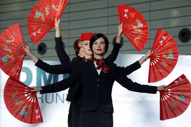MOSCOW REGION, RUSSIA - JULY 12, 2016: VIM Airlines employees showcase clothes during the 2016 DME Runway fashion show marking International Flight Attendant Day at Domodedovo International Airport. Mikhail Metzel TASS  TS029C2A