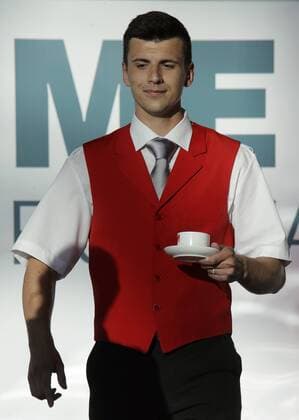 MOSCOW REGION, RUSSIA - JULY 12, 2016: A model showcases an Austrian Airlines flight attendant s uniform during the 2016 DME Runway fashion show marking International Flight Attendant Day at Domodedovo International Airport. Mikhail Metzel TASS  TS029C38