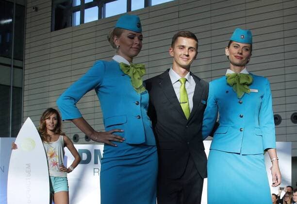 MOSCOW REGION, RUSSIA - JULY 12, 2016: Models showcase S7 Airlines flight attendants uniform during the 2016 DME Runway fashion show marking International Flight Attendant Day at Domodedovo International Airport. Mikhail Metzel TASS  TS029C3C