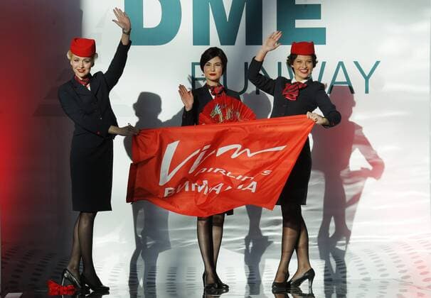 MOSCOW REGION, RUSSIA - JULY 12, 2016: VIM Airlines employees showcase clothes during the 2016 DME Runway fashion show marking International Flight Attendant Day at Domodedovo International Airport. Mikhail Metzel TASS  TS029C40